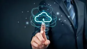 Hand pointing toward an illustrated cloud