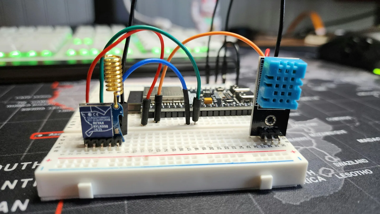 Electronic sensors connected by wires on a breadboard